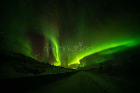 Stunning Aurora Borealis Illuminating The Night Sky Above The Rural