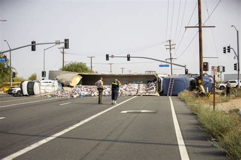 Semi Truck Involved In Crash After Running Red Light On Highway 395 In