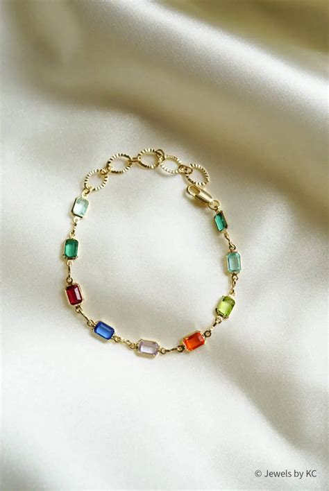 Gouden Armband Met Gekleurde Zirkonia Steentjes Regenboog Baguette