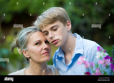 A Mother And Son Share A Touching Moment In Their Garden In London