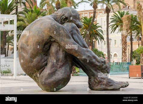 CARTAGENA SPAIN 12 SEPTEMBER 2022 Statue Bronze Represents The Figure Of A Seated Man Naked