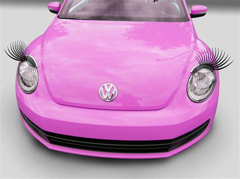 Pink Volkswagen Beetle Convertible With Eyelashes