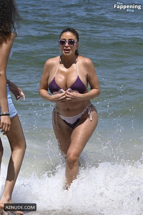 Larsa Pippen Stuns In A Sexy Purple String Bikini At Miami Beach Event AZNude