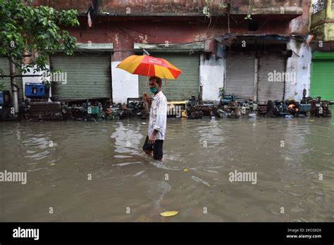 A Man Waded Through A Water Logged Street In Kolkata India On June