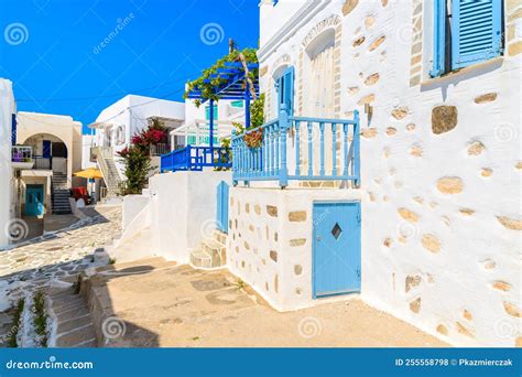 Street With Traditional White Greek Houses In Naoussa Town Paros