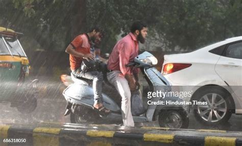 58 Heavy Rain Lashes Delhi Ncr Brings Respite From Scorching Heat Stock