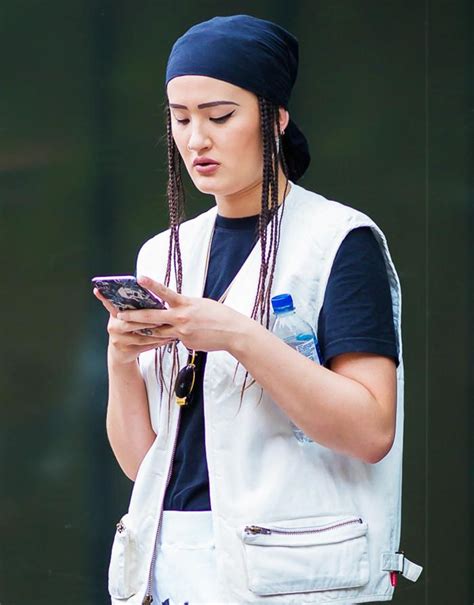 How Fashion Girls Are Wearing Their Scarves | Who What Wear