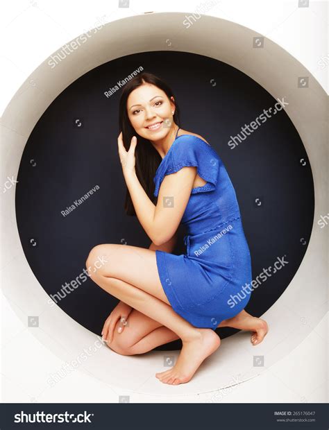 Sexy Brunette Blue Dress Sitting Circle Stock Photo 265176047 Shutterstock