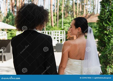 Side View Of Interracial Lesbian Couple Stock Photo Image Of Outdoors