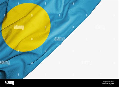 Palau Flag Of Fabric With Copyspace For Your Text On White Background