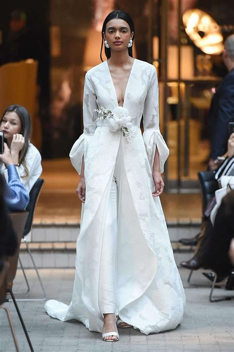 Bridal gown trends veer toward modesty but don’t lack drama