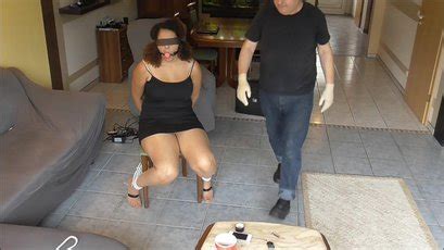 Chubby Babe With Chocolate Skin Getting Ball Gagged And Tied Up Photos