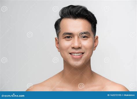 Photo Of Smiling Mature Man Standing Isolated Over White Wall Background Naked Looking Camera