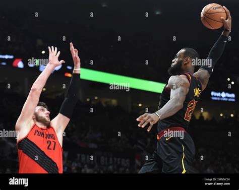 Cleveland Cavaliers Forward LeBron James Right Goes Up For A Dunk On