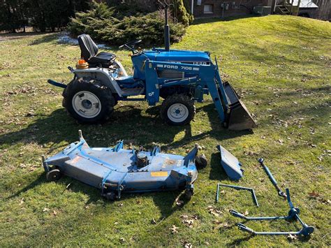 Ford 1220 Tractor With 7106 Loader And 914 Mower Proxibid