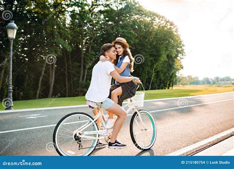 Full Length Photo Romantic Couple In Love On Bike On Sunset Handsome