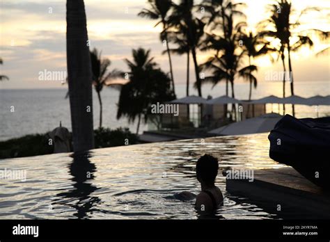 Sunset Pool View at Andaz Maui Resort Stock Photo - Alamy