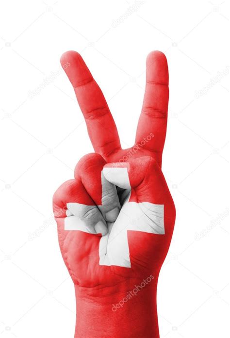 Hand Making The V Sign Switzerland Flag Painted As Symbol Of Vi