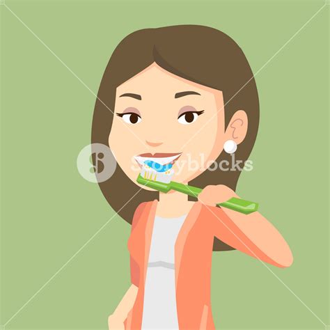 Young caucasian woman brushing her teeth. Smiling woman cleaning teeth ...