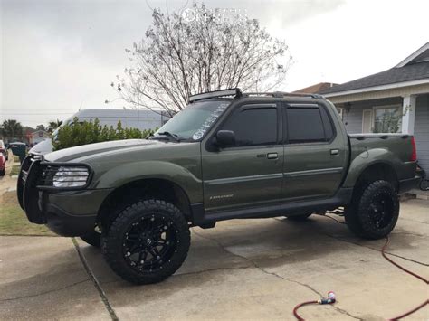 Black Ford Explorer Sport Trac Lifted