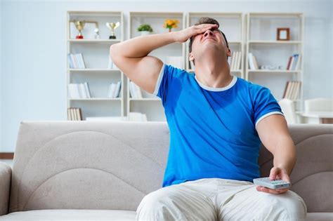 Premium Photo Man Sweating Excessively Smelling Bad At Home