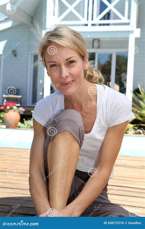 Mature Woman Relaxing On Terrace Stock Photo Image Of Lifestyle