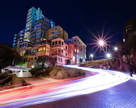 a city street at night with long exposure