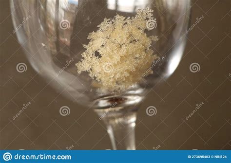 White Wine Tartrate Crystals Stuck To The Inside Of An Empty Wine Glass Stock Image Image Of