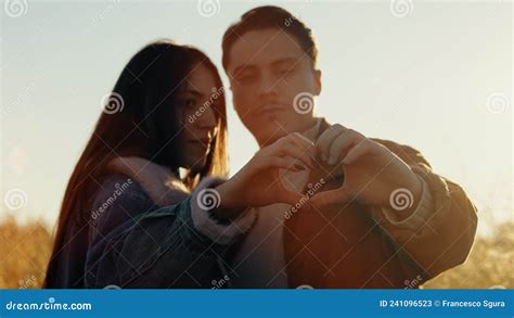 Romantic Couple in Love Make Heart with Their Hands Stock Image - Image ...