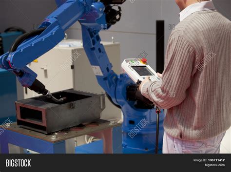 Industrial Robot Arm. Image & Photo (Free Trial) | Bigstock