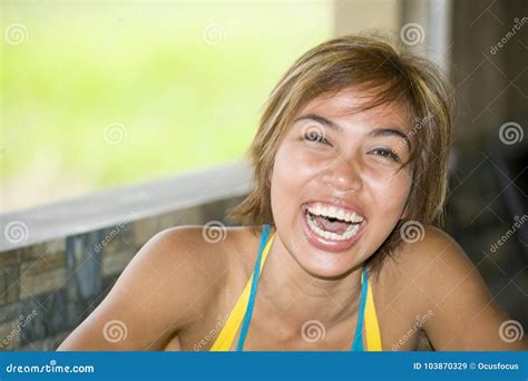 Close Up Portrait Of Young Happy And Beautiful Expressive Asian Woman