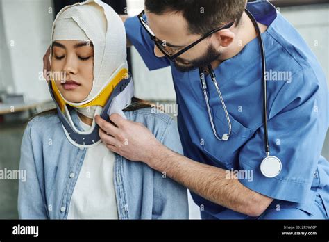 Professional Paramedic With Stethoscope In Uniform And Eyeglasses