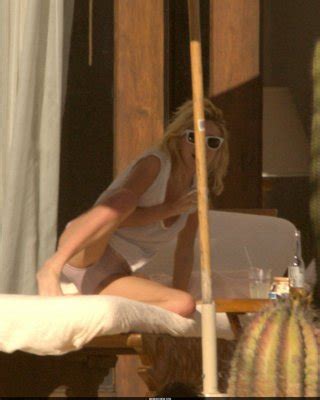 Ashley Olsen Exposing Her Sexy Body And Nice Tits In See Thru Shirt On Pool Porn Pictures XXX