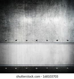 thousand black metal plate  rivets  white background royalty