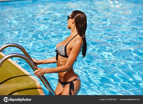 Portrait Beautiful Elegant Tanned Woman Relaxing Bikini Sunglasses Swimming Pool Stock Photo