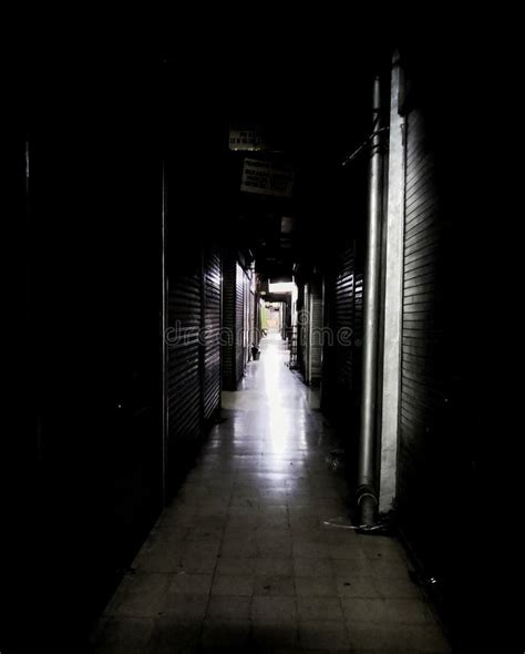 Scary long dark hallway stock image. Image of hallway - 263984487