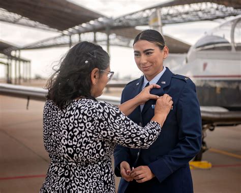 Students receive their Air Force wings during graduation ceremony at ...