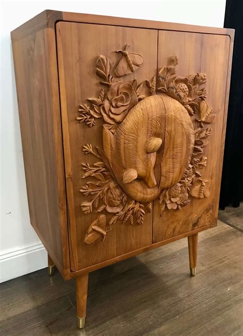 A Solid Teak Bar Cabinet with a Carved Fox - Artedeco - Online Antiques