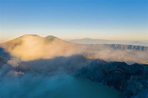 Aerial View Of Rock Cliff At Kawah Ijen Volcano With Turquoise Sulfur