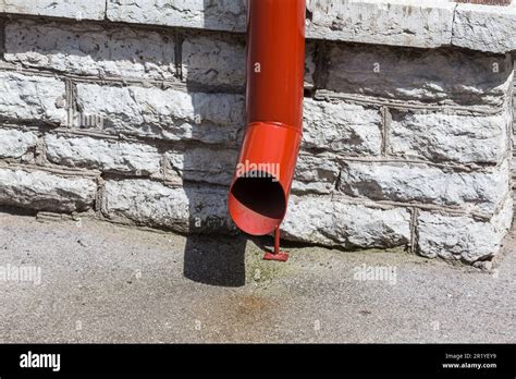 Red Color Rain Gutters On Old Home Stock Photo Alamy