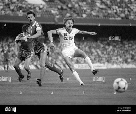 The Ussr National Team Forward Oleg Blokhin Right During A Match