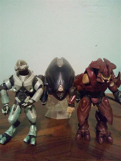 Old school Elite action figure next to a new school Elite action figure ...