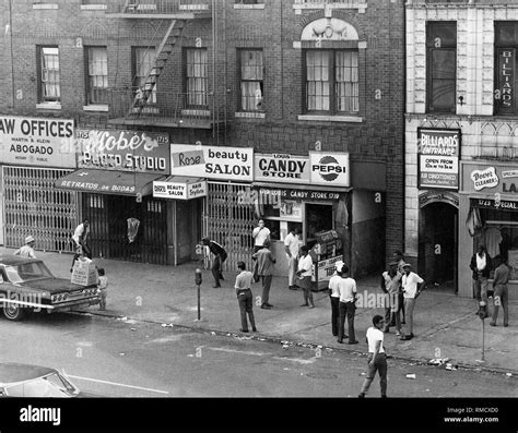 Street Scene In The New York District Of Harlem Inhabited Mainly By