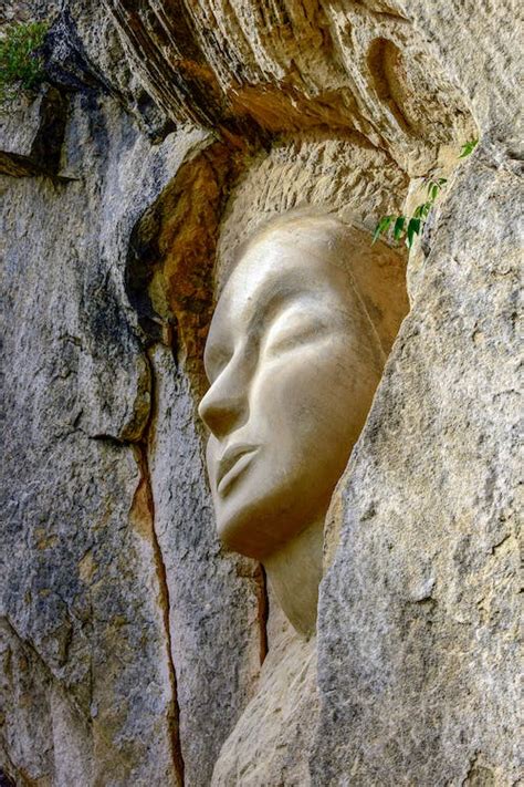 Stone Face Sculpture in Rock · Free Stock Photo