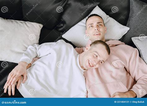 Happy Gay Couple Lying On Bed At Home Stock Image Image Of Homosexual Male