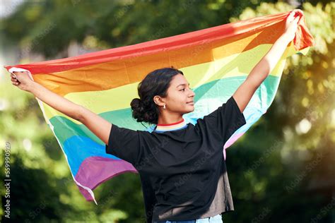Rainbow Flag And Human Rights With An Indian Woman In Celebration Of Lgbt Gay Pride Alone