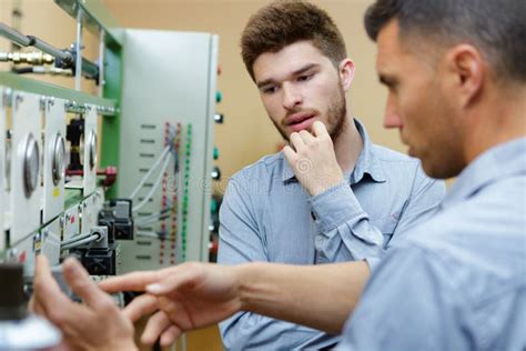 Two Worker in Factory on Machine Stock Image - Image of workplace ... 