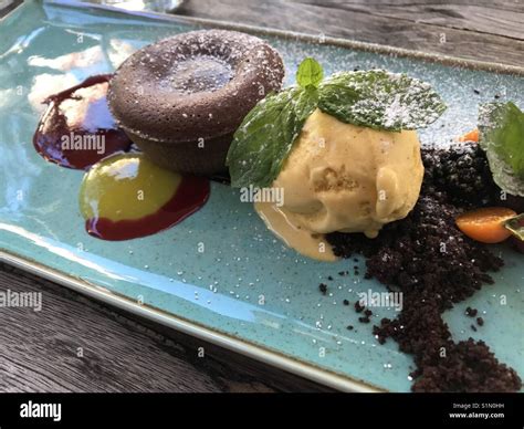 Ice cream with chocolate fondant Stock Photo - Alamy