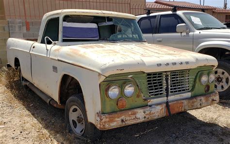 Lot 1961 Dodge D100 Sweptline 12 Ton Truck