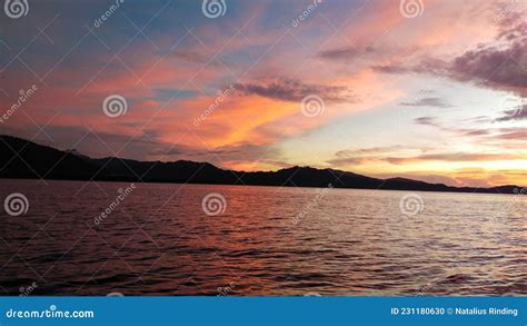 Sunset at Sea / Sunset Di Laut Stock Photo - Image of cloud, wave ...